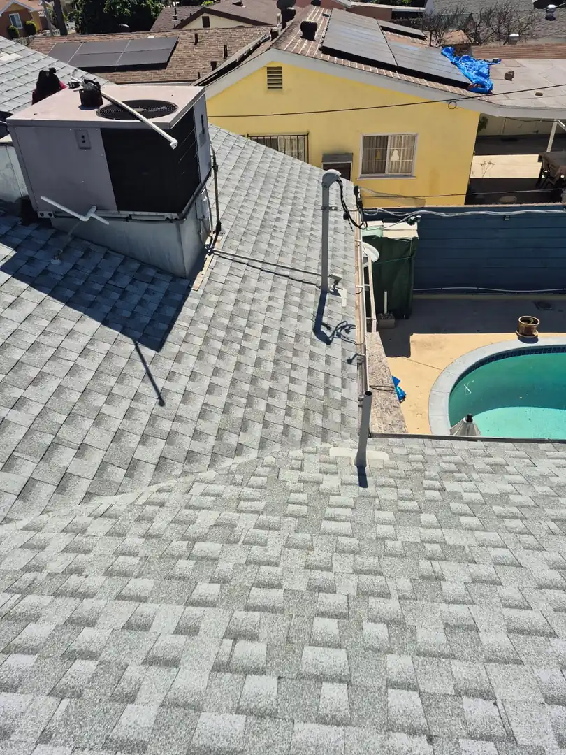 Completed shingle roofing project